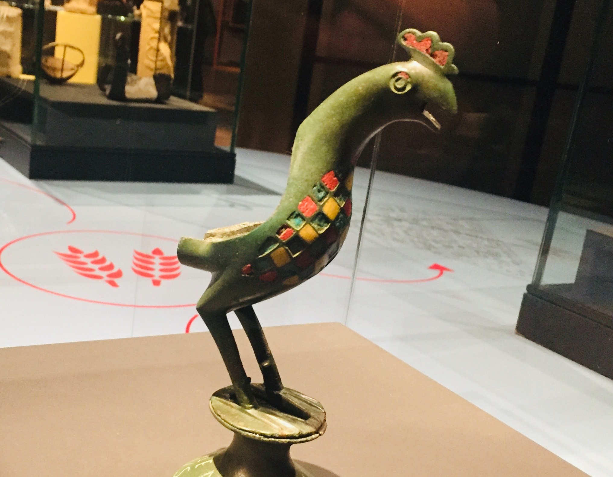 Een met email versierd bronzen haantje van de Romeinse veteraan Ulpius Verinus, die zich in Limburg had gevestigd.