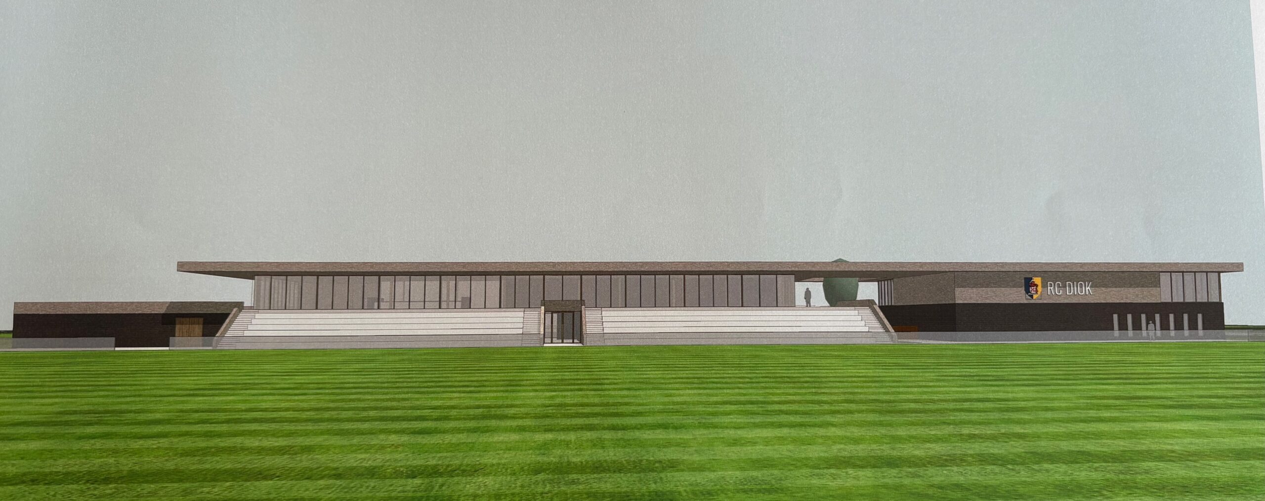 Aanzicht vanaf het hoofdveld. De spelerstunnel leidt direct naar de acht kleedkamers en andere faciliteiten.